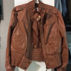 Brown leather jacket. Size medium.